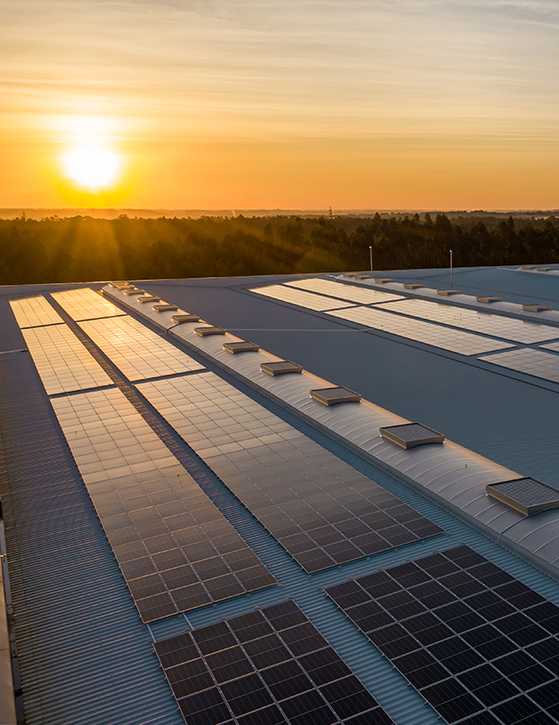 sun on roof with solar panels